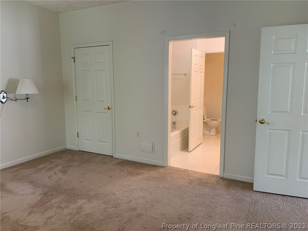 516 Lionshead Road, Unit 6 Fayetteville, NC 28311 - Photo 14 of 24 an empty room with windows