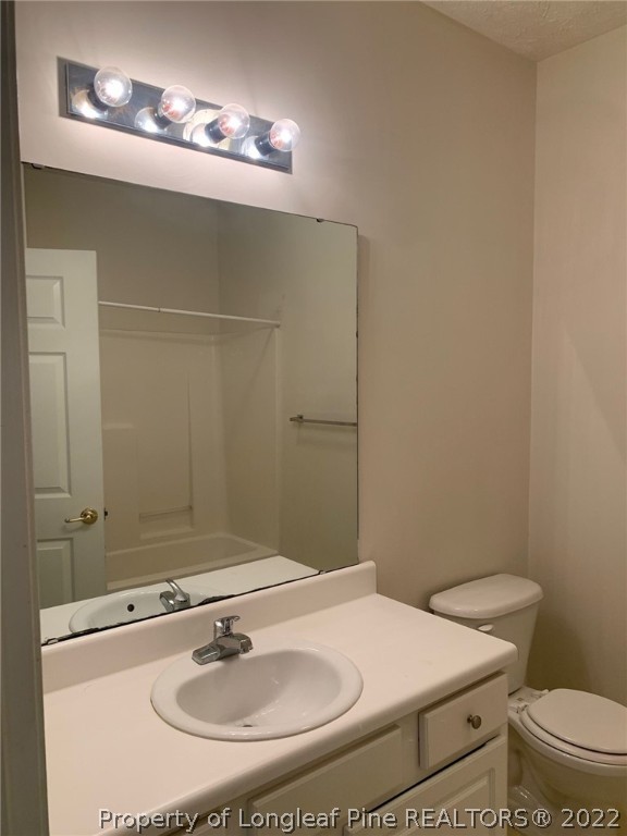 516 Lionshead Road, Unit 6 Fayetteville, NC 28311 - Photo 18 of 24 a bathroom with a sink and a mirror