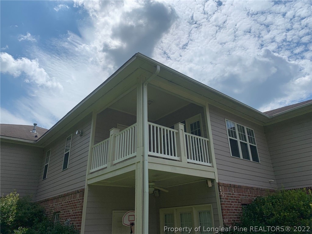 516 Lionshead Road, Unit 6 Fayetteville, NC 28311 - Photo 19 of 24 a front view of a house with a yard