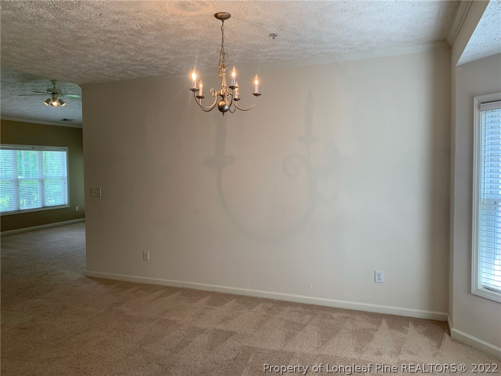 516 Lionshead Road, Unit 6 Fayetteville, NC 28311 - Photo 2 of 24 wooden floor in an empty room with a window