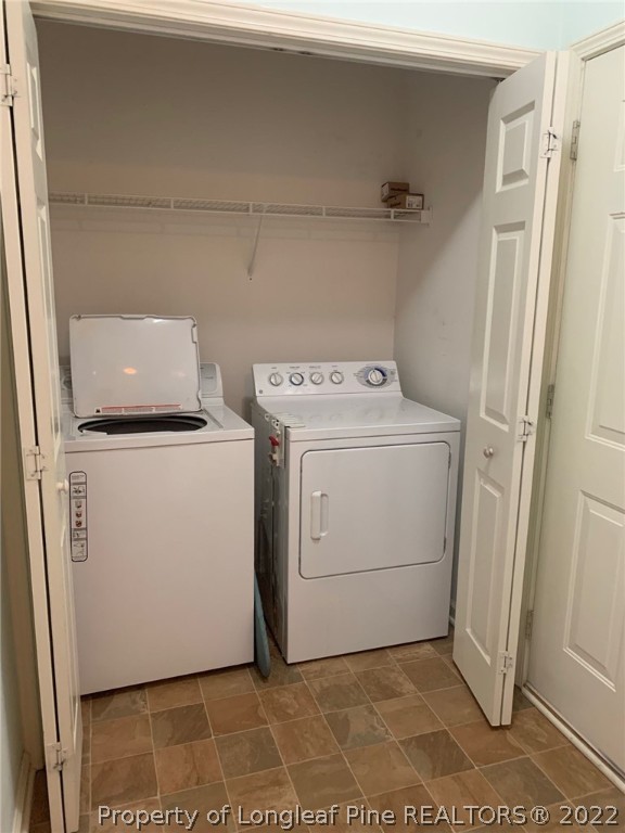 516 Lionshead Road, Unit 6 Fayetteville, NC 28311 - Photo 6 of 24 a utility room with dryer and washer