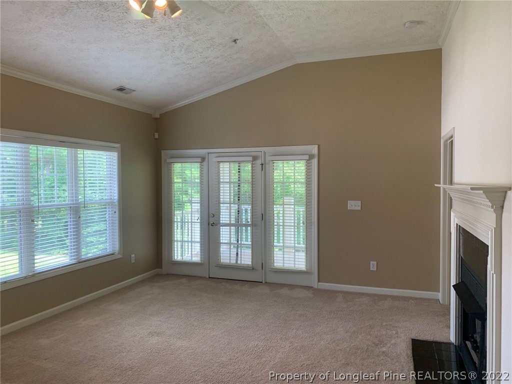 516 Lionshead Road, Unit 6 Fayetteville, NC 28311 - Photo 8 of 24 an empty room with a fireplace