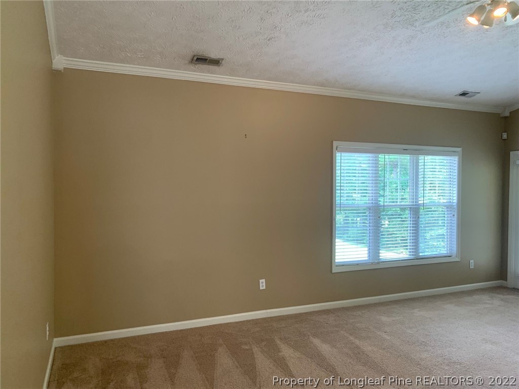 516 Lionshead Road, Unit 6 Fayetteville, NC 28311 - Photo 9 of 24 a view of an empty room with a window