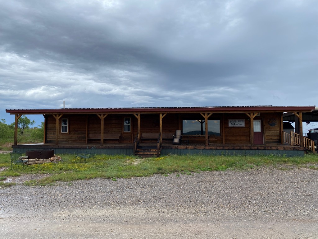 906 C R 235 Old Glory, TX 79540 - Photo 11 of 40 a view of a yard in front of a house