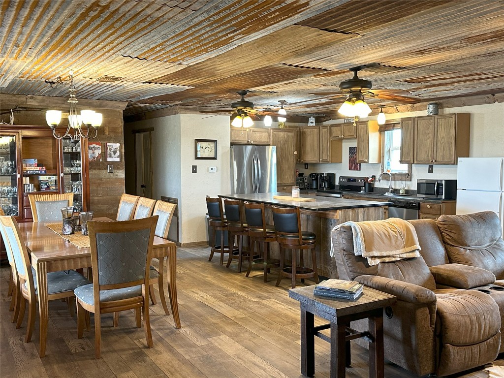 906 C R 235 Old Glory, TX 79540 - Photo 13 of 40 a living room with lots of furniture and kitchen view