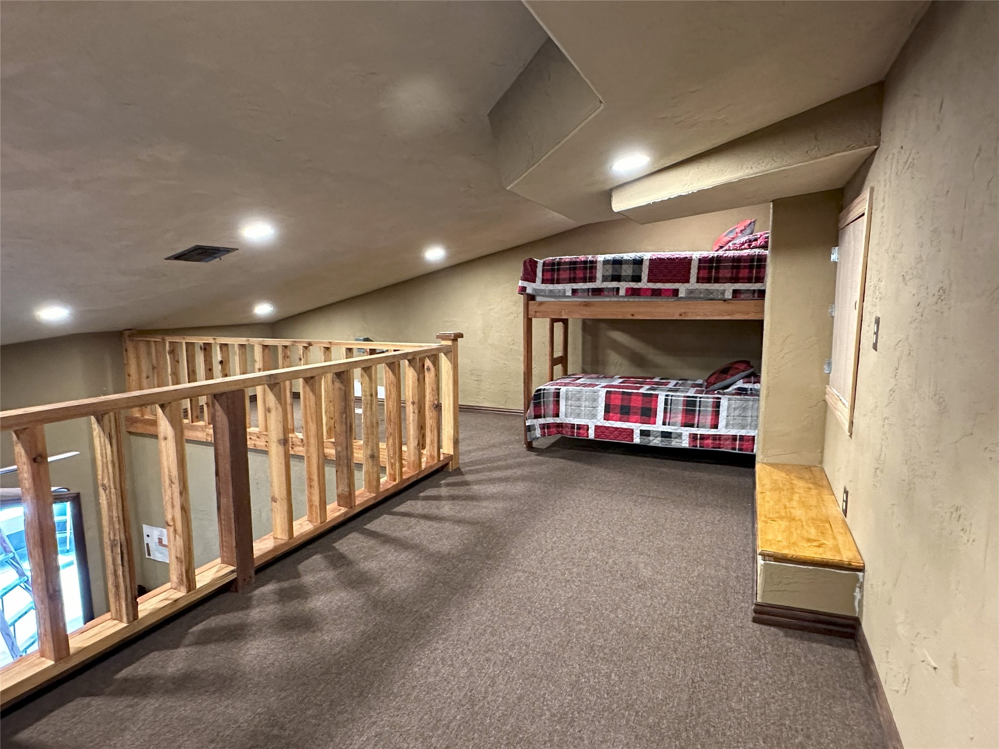 906 C R 235 Old Glory, TX 79540 - Photo 31 of 40 Carpeted bedroom featuring a textured wall, recessed lighting, and baseboards