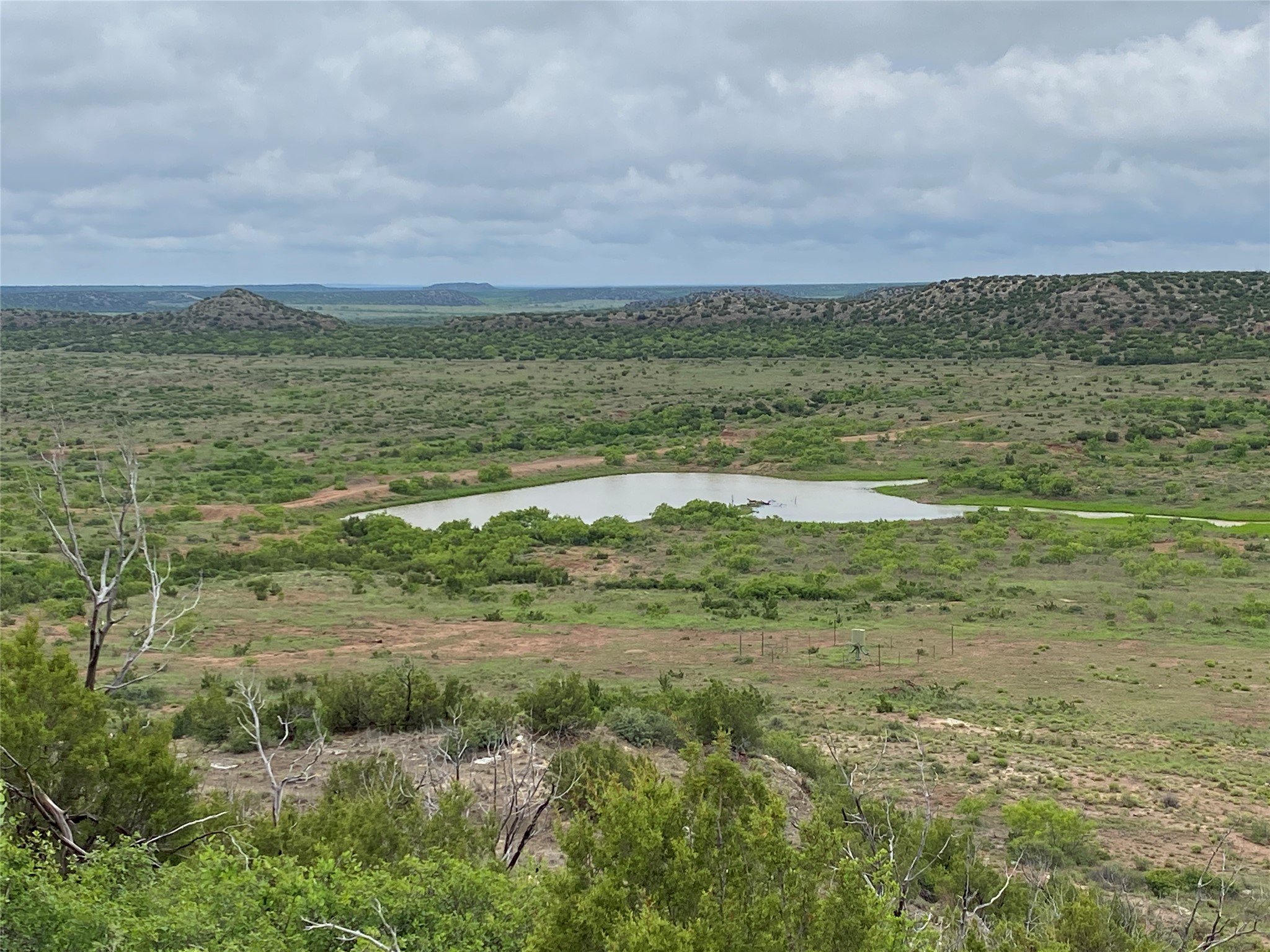 906 C R 235 Old Glory, TX 79540 - Photo 5 of 40 View of mountain background featuring a large body of water