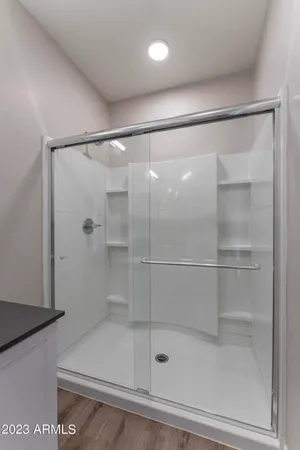 a bathroom with a bathtub and a sink