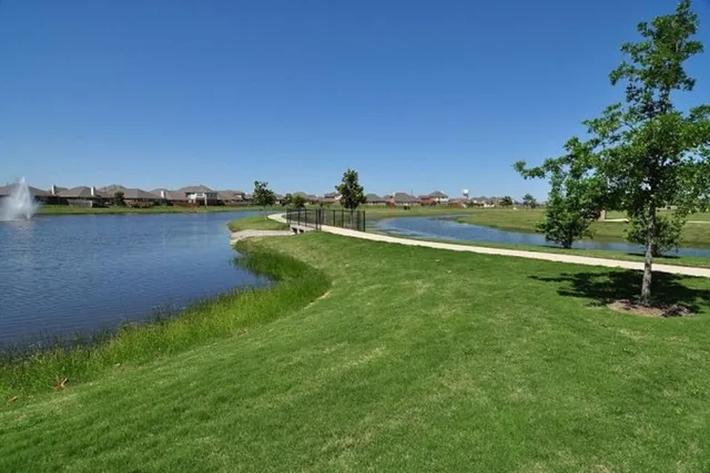 a view of a park with a slide