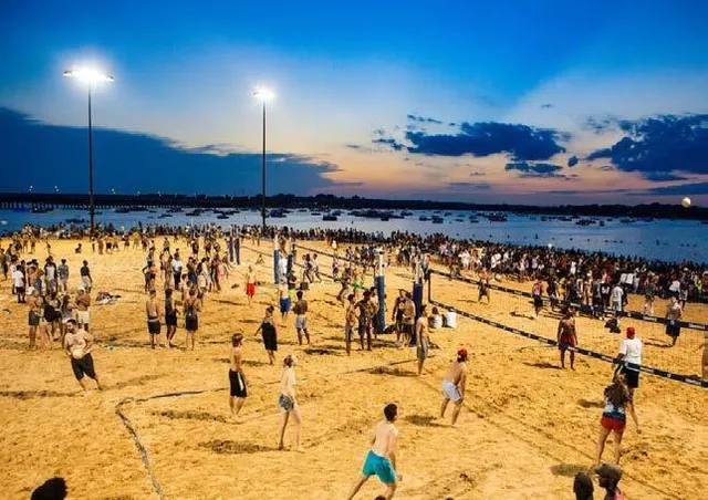 an aerial view of a house with a lake view