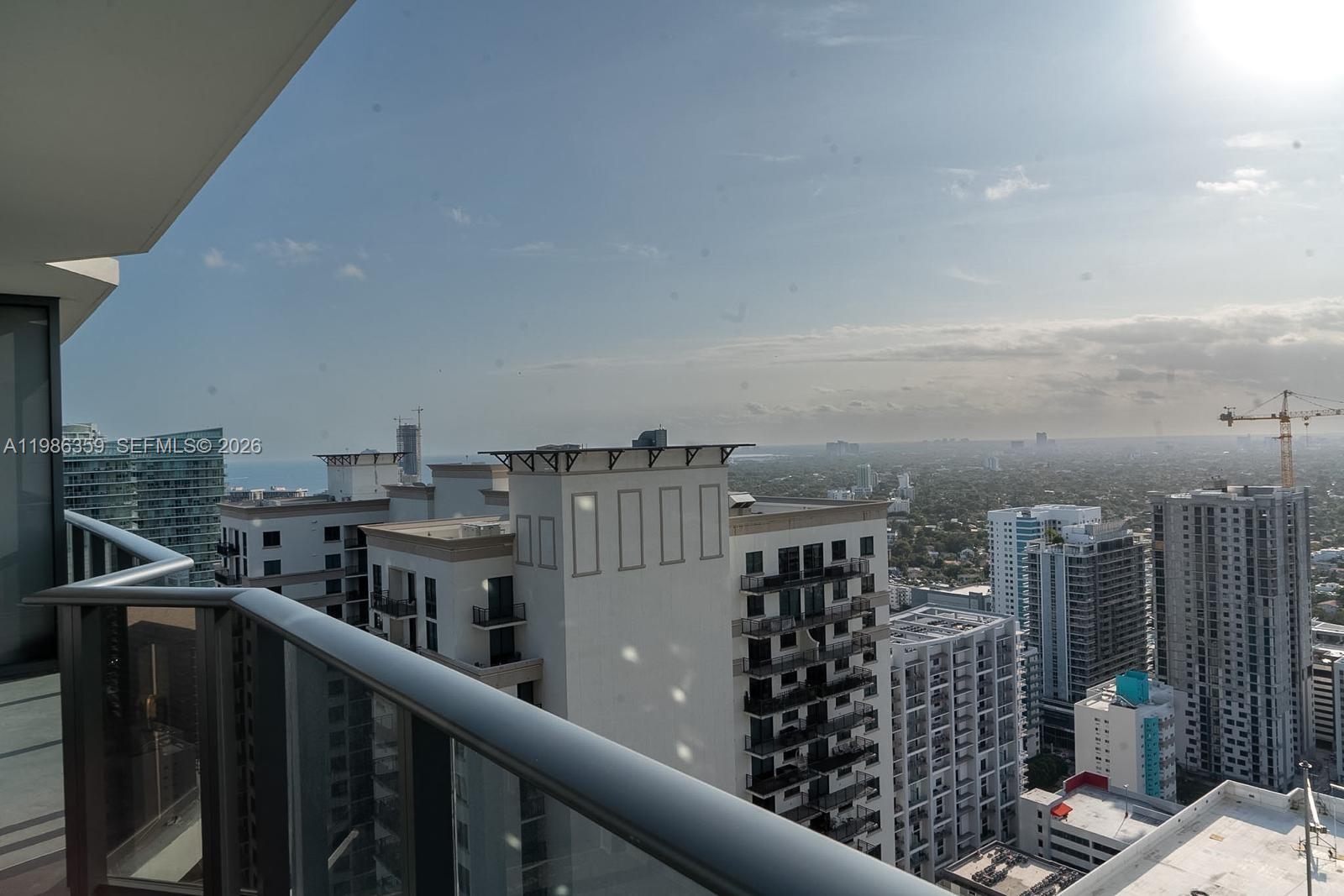 55 Southwest 9th Street, Unit 3607 Miami, FL 33130 - Photo 9 of 15 a view of a balcony with city view