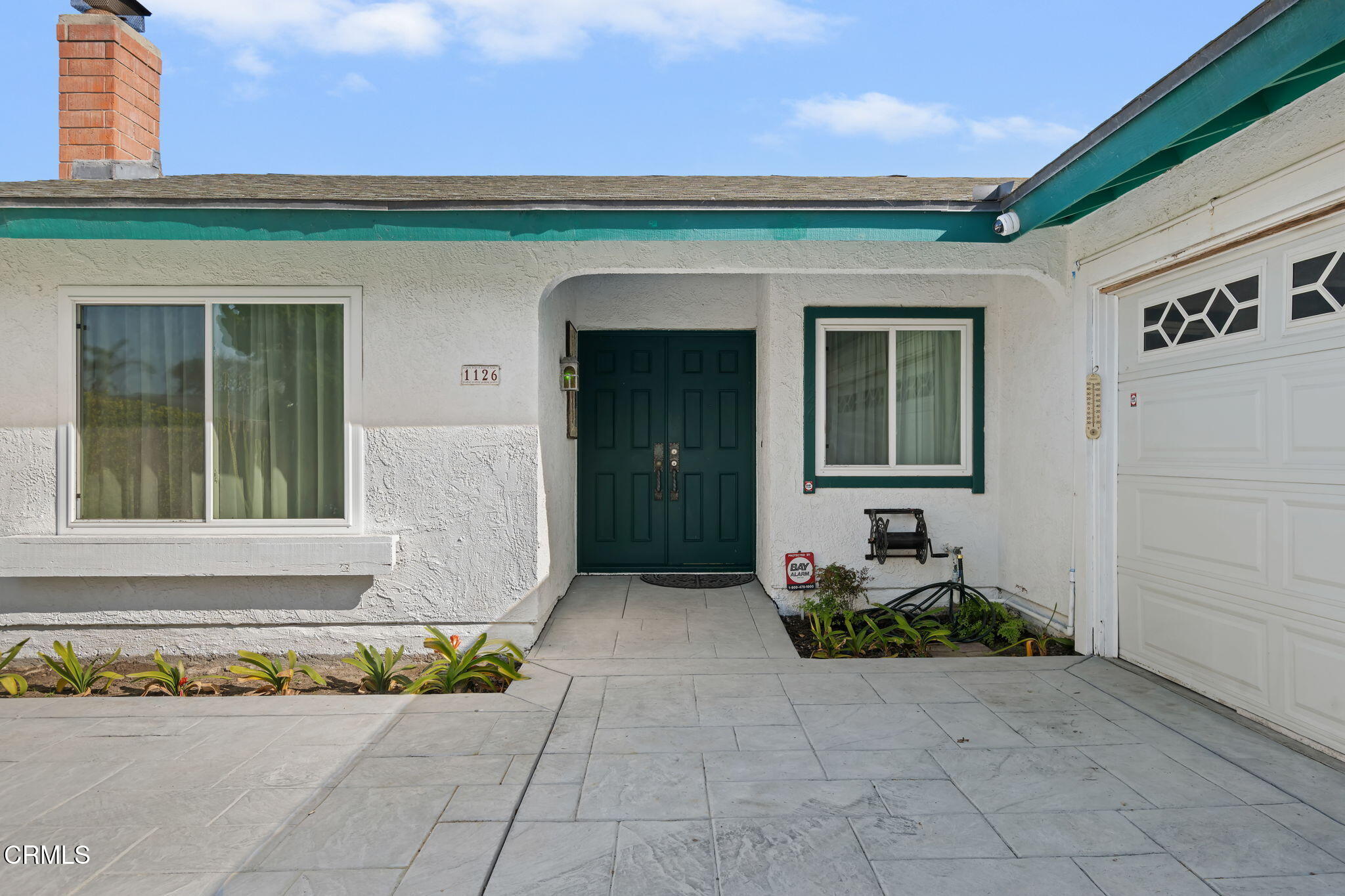 1126 Lawrence Way Oxnard, CA 93035 - Photo 5 of 16 a front view of a house