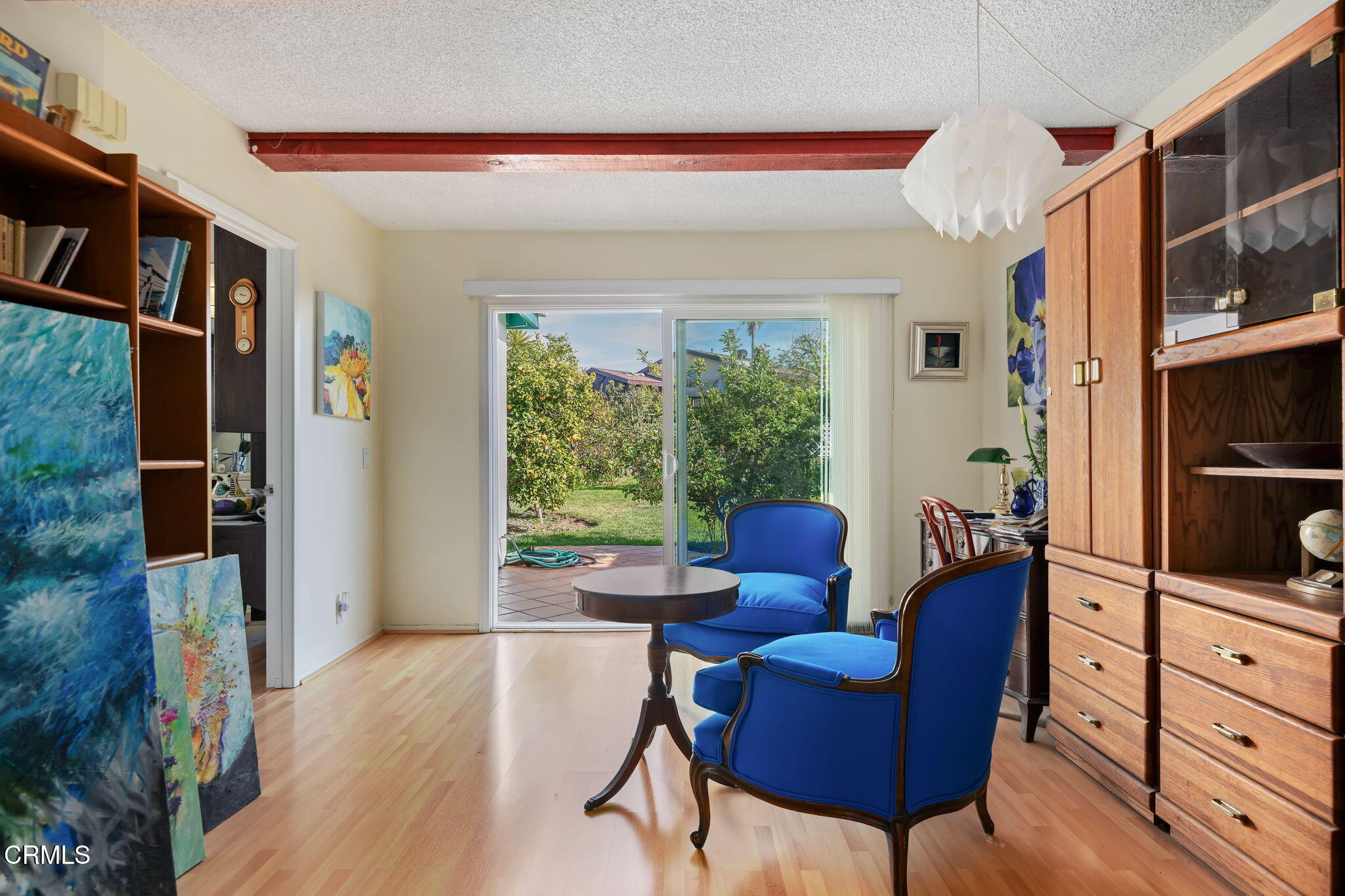 1126 Lawrence Way Oxnard, CA 93035 - Photo 8 of 16 a living room with furniture a rug and a window