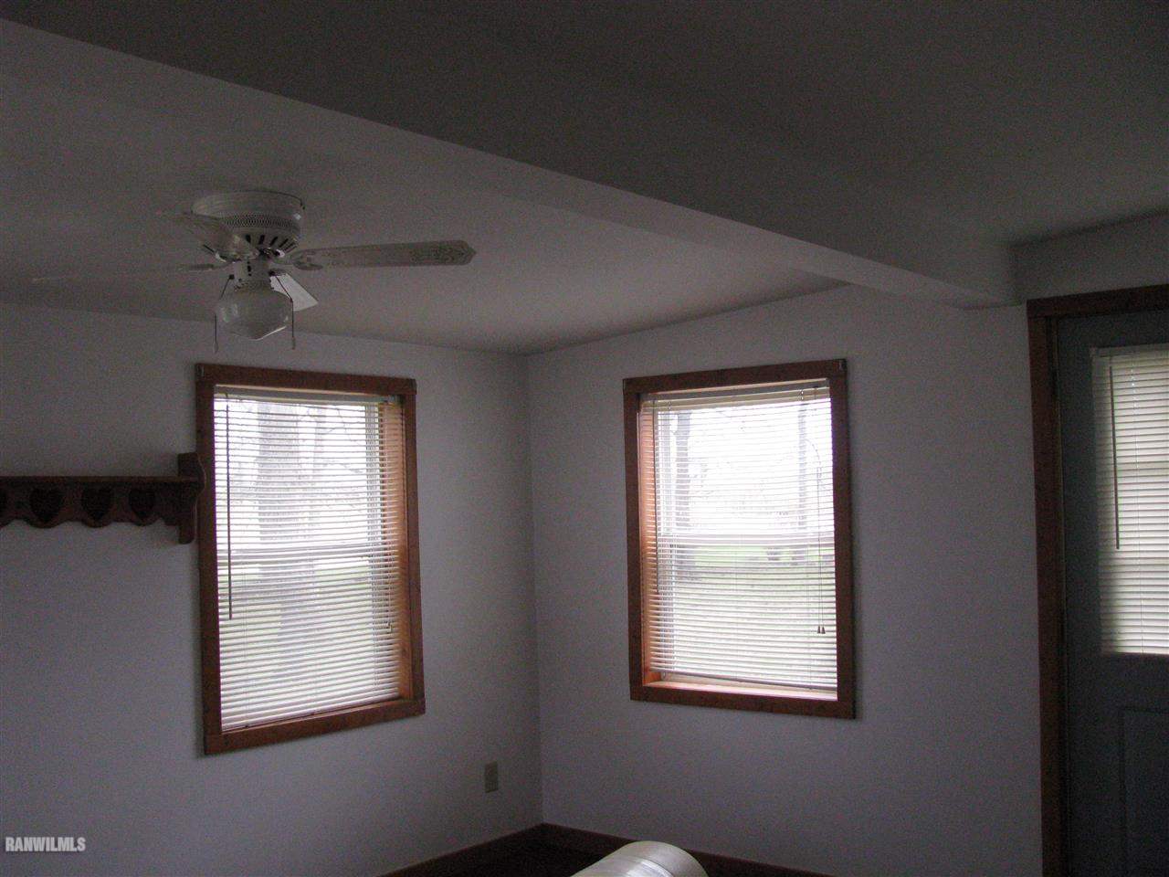 8984 West Lightsville Road German Valley, IL 61039 - Photo 2 of 8 a view of an empty room with a window