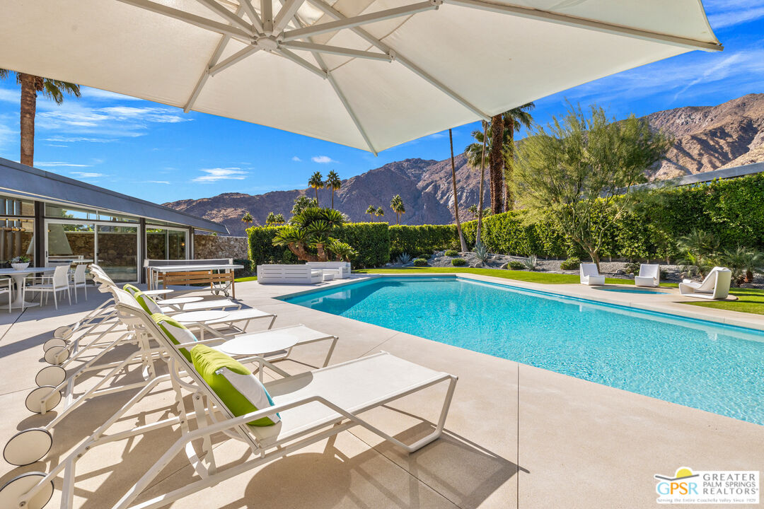 1350 Ladera Circle Palm Springs, CA 92262 - Photo 6 of 10 a view of a swimming pool with a patio