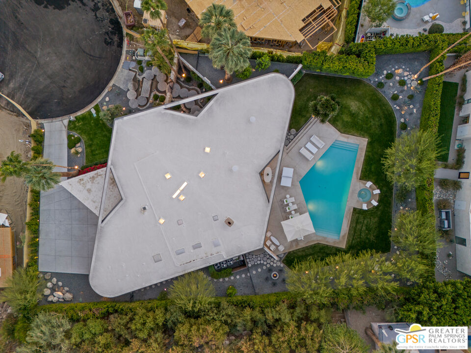 1350 Ladera Circle Palm Springs, CA 92262 - Photo 9 of 10 an aerial view of a house with yard and mountain view