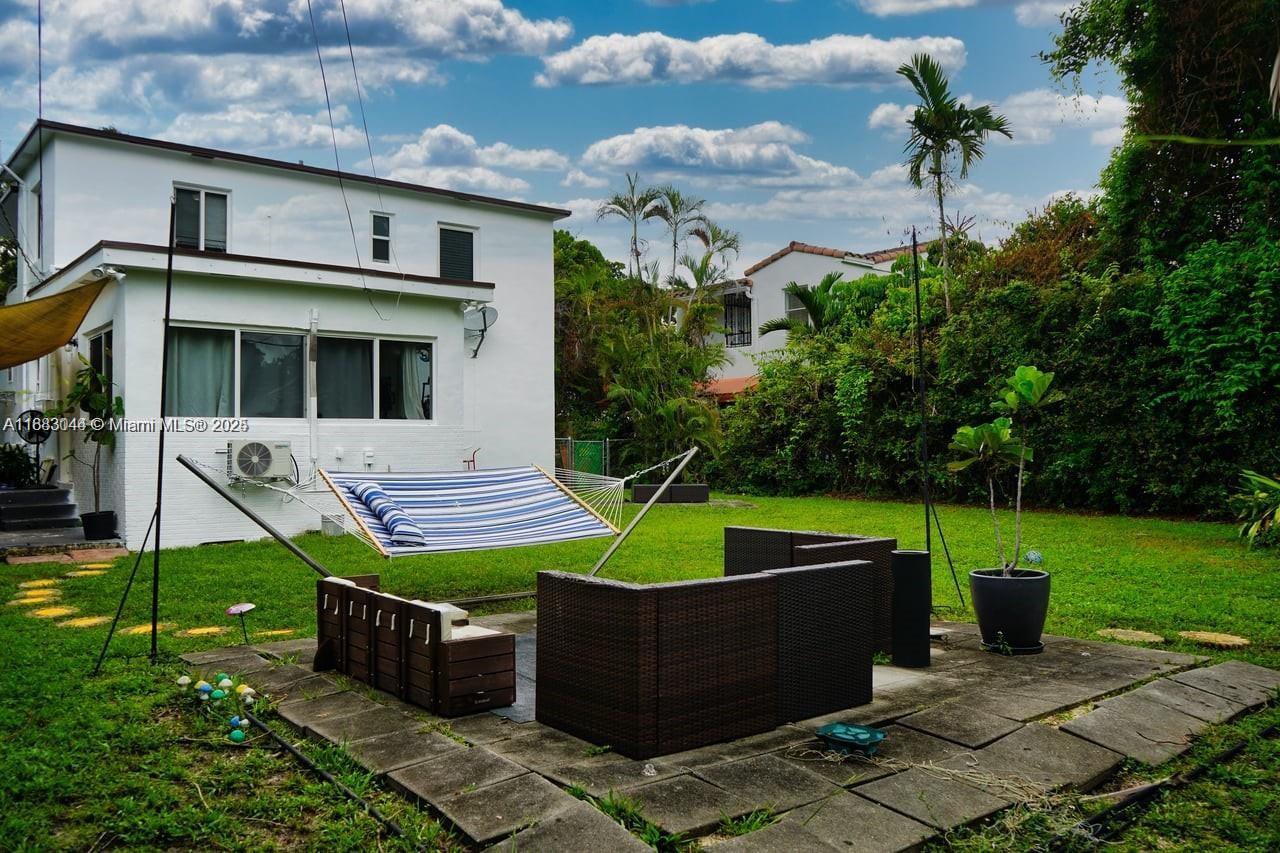 3770 Southwest 27th Street, Unit 3772 Miami, FL 33134 - Photo 12 of 15 a view of a backyard with plants
