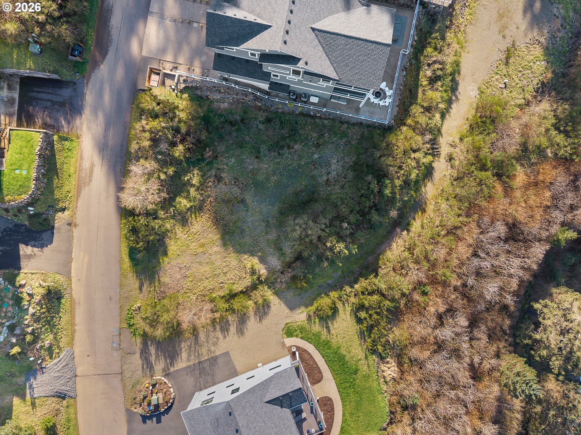 South Beach Road, Unit TL 507 Neskowin, OR 97149 - Photo 7 of 14 an aerial view of a house with a yard