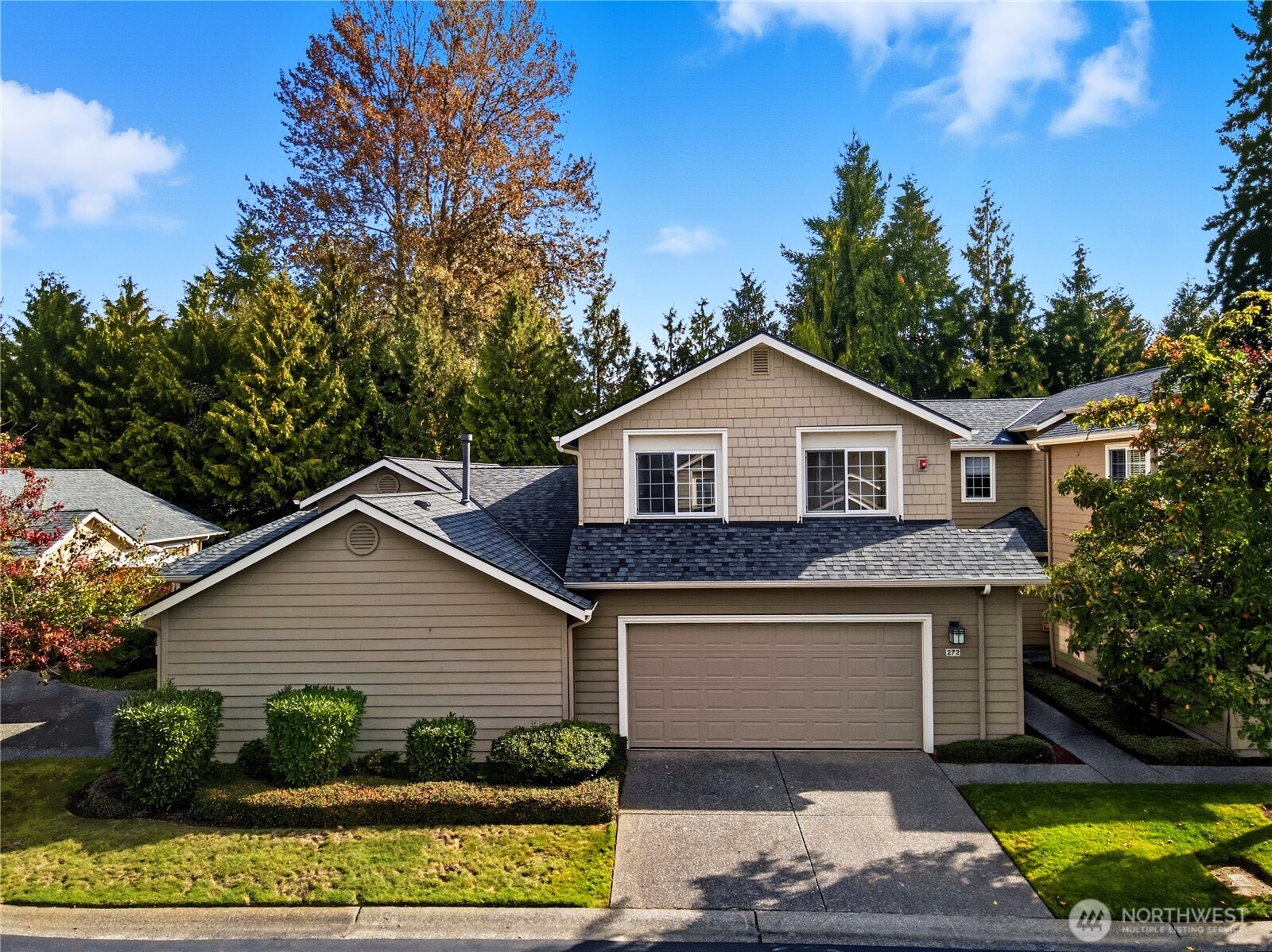 1430 West Casino Road, Unit 272 Everett, WA 98204 - Photo 1 of 37 a front view of a house with garden