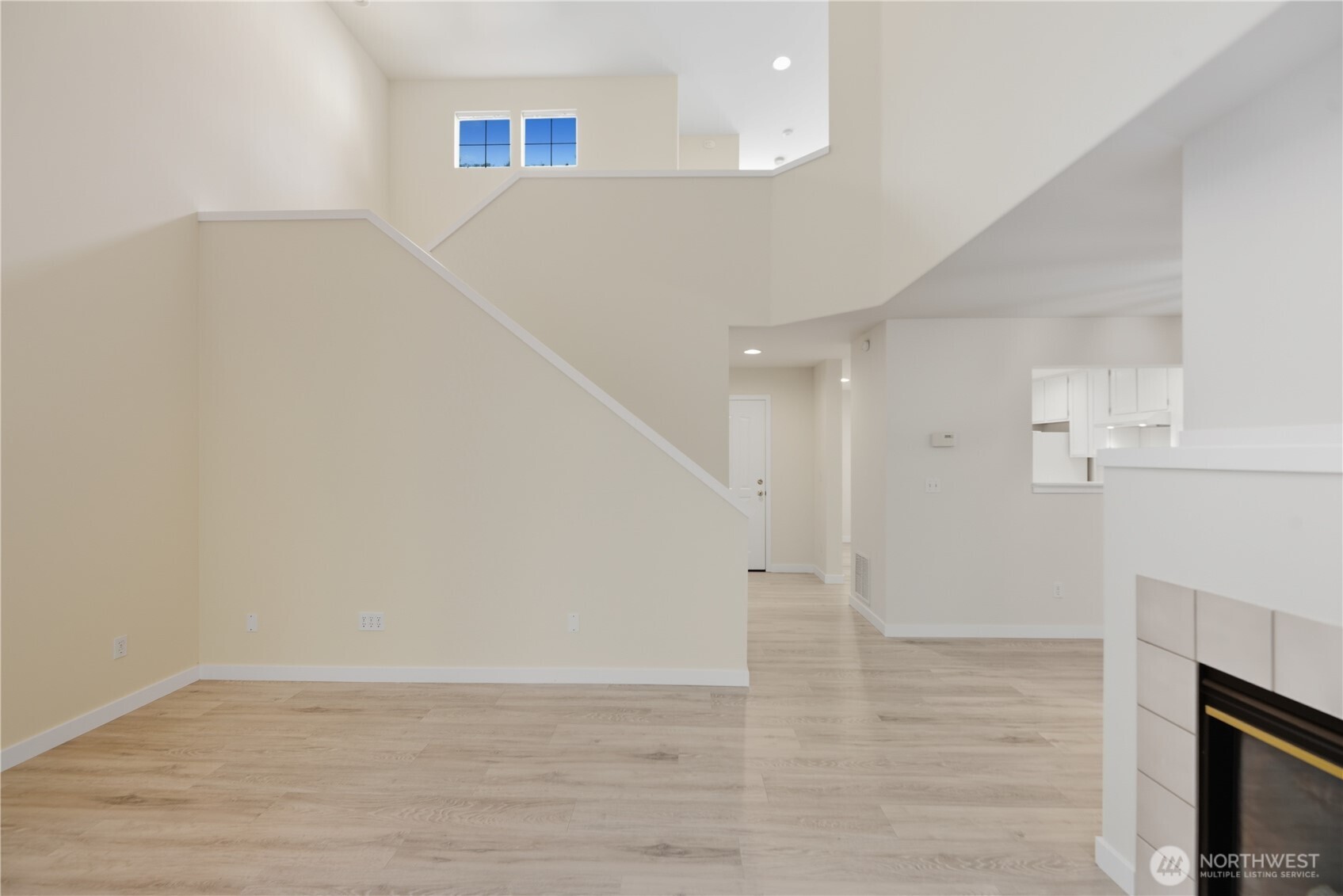 1430 West Casino Road, Unit 272 Everett, WA 98204 - Photo 10 of 37 a view of empty room with wooden floor and electronic appliances