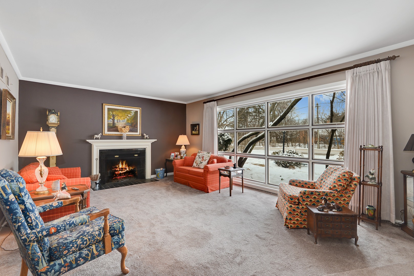 3225 Illinois Road Wilmette, IL 60091 - Photo 2 of 21 a living room with furniture and a fireplace