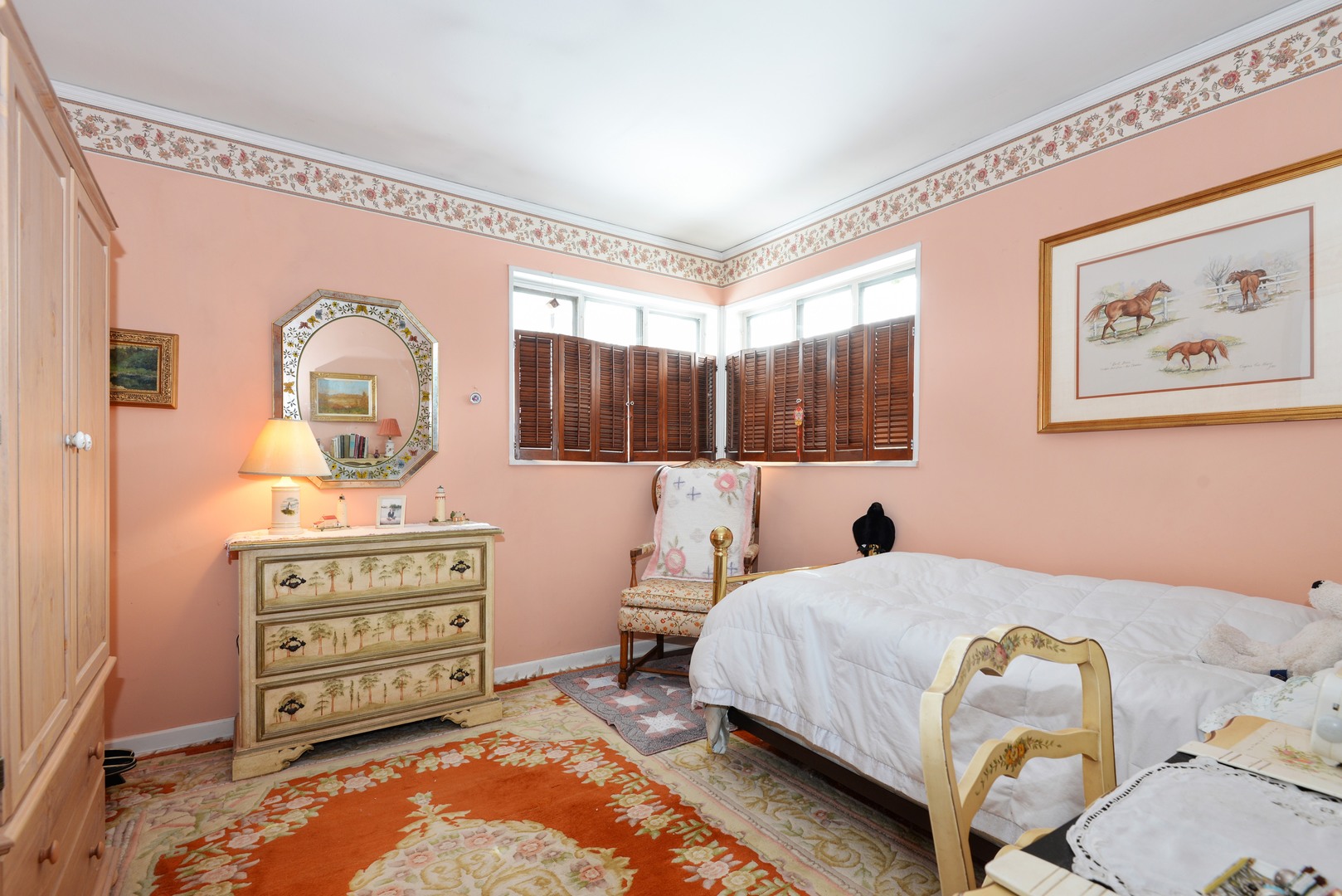 3225 Illinois Road Wilmette, IL 60091 - Photo 15 of 21 a bedroom with a bed and a dresser