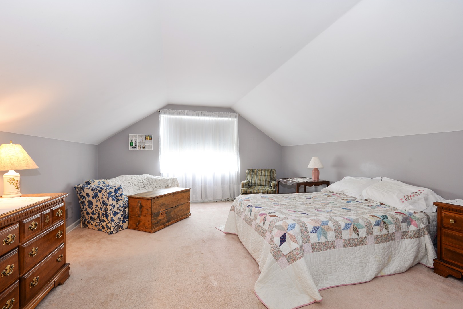 3225 Illinois Road Wilmette, IL 60091 - Photo 17 of 21 a bedroom with a bed and window
