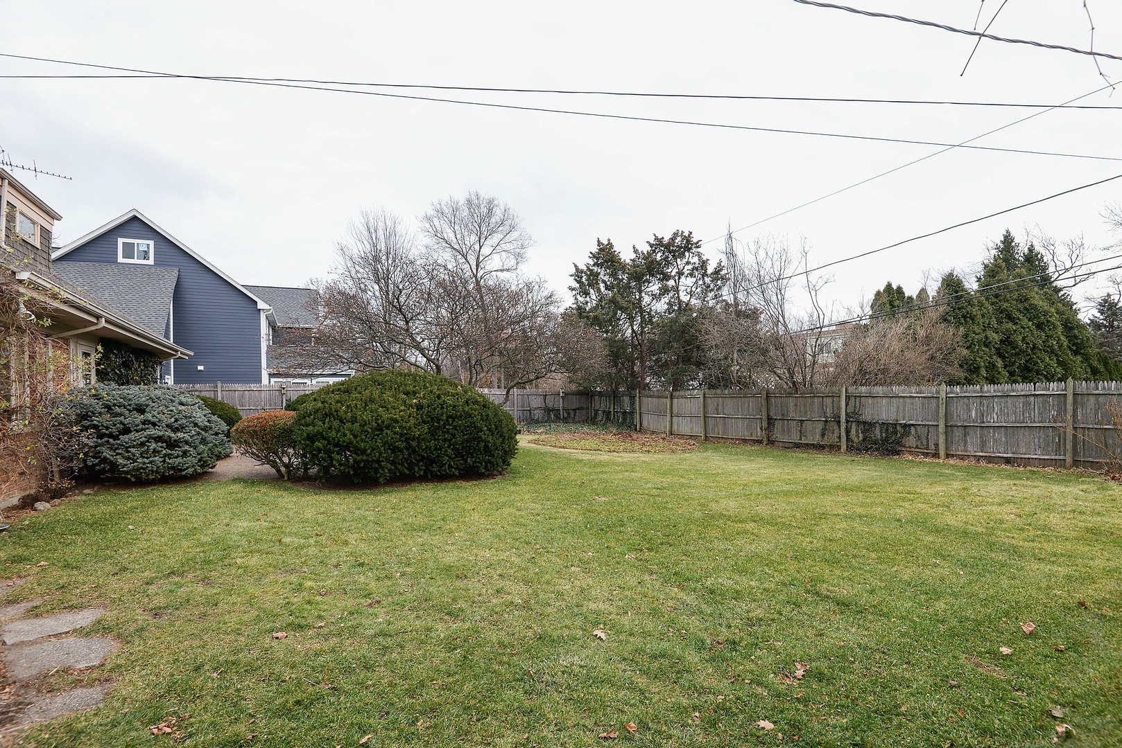 3225 Illinois Road Wilmette, IL 60091 - Photo 21 of 21 a view of a backyard with potted plants