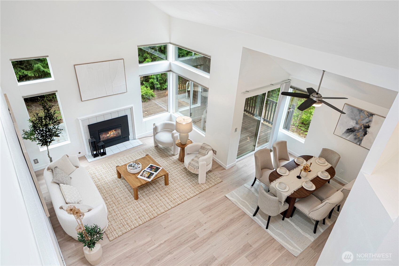 11719 Northeast 166th Court Bothell, WA 98011 - Photo 19 of 27 a living room with furniture and a fireplace