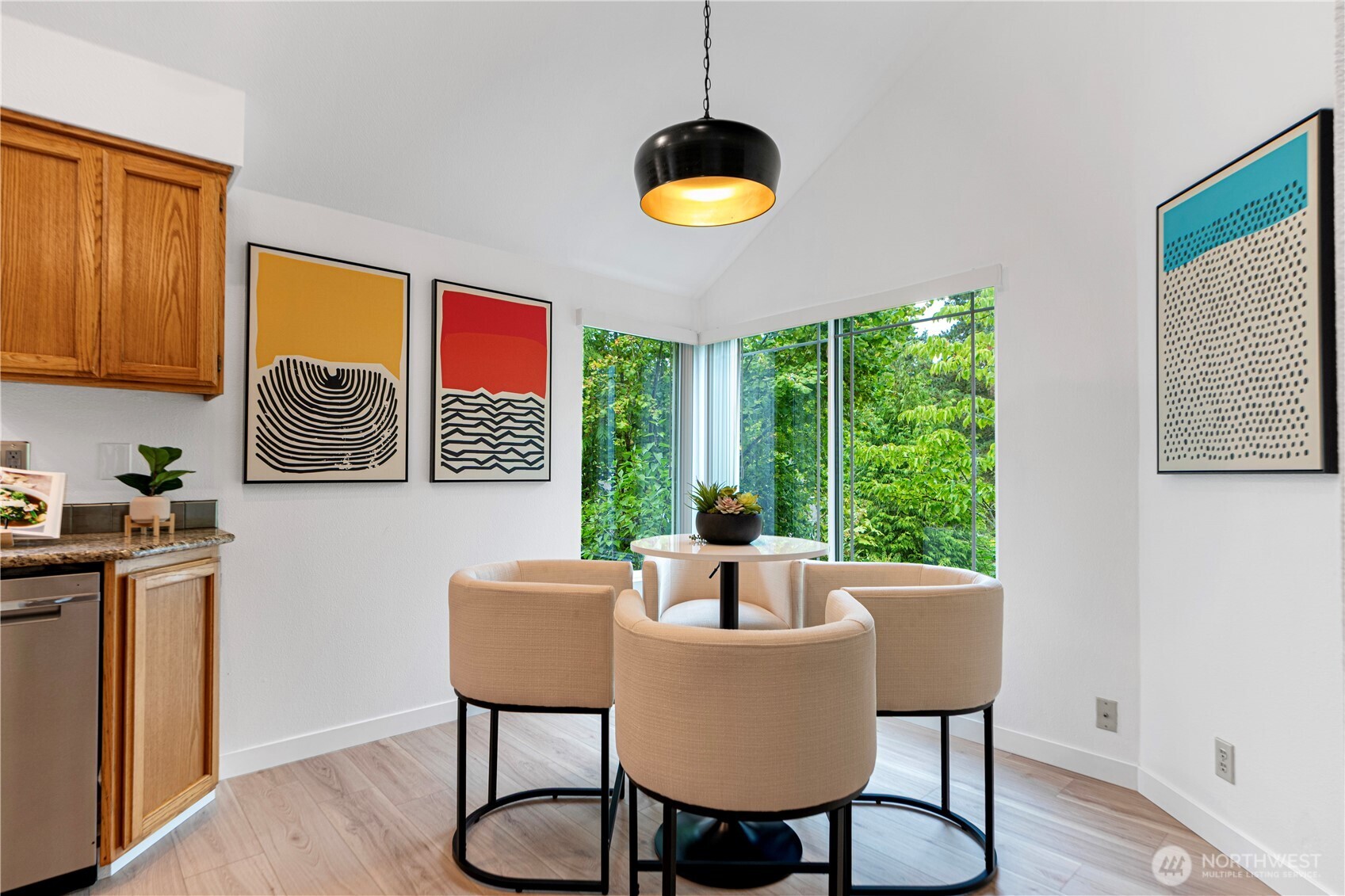 11719 Northeast 166th Court Bothell, WA 98011 - Photo 7 of 27 a dining room with furniture a window and wooden floor