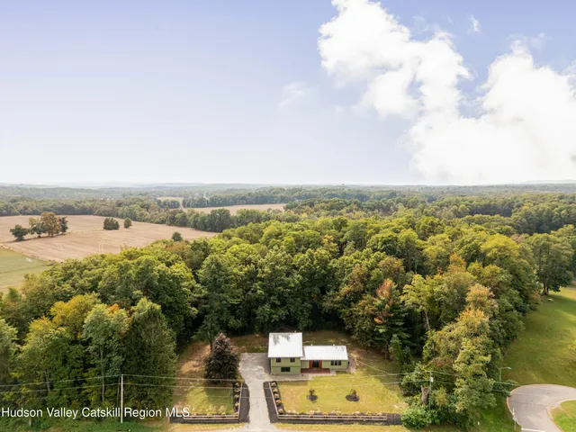 an aerial view of residential building with outdoor space