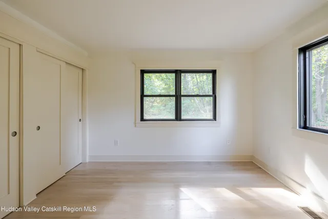 an empty room with windows