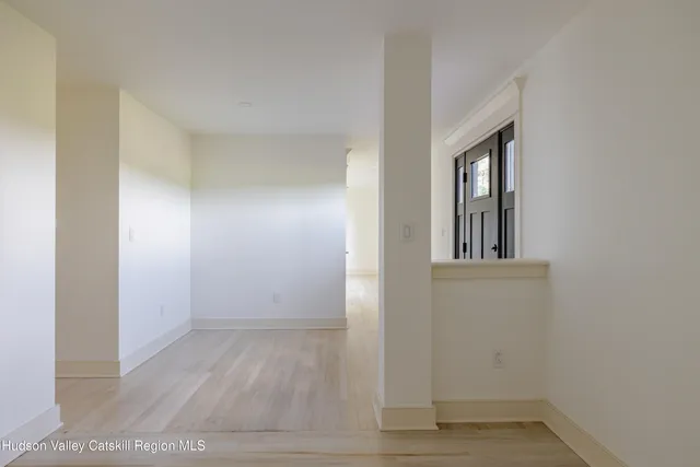 a kitchen with stainless steel appliances granite countertop a refrigerator and a stove