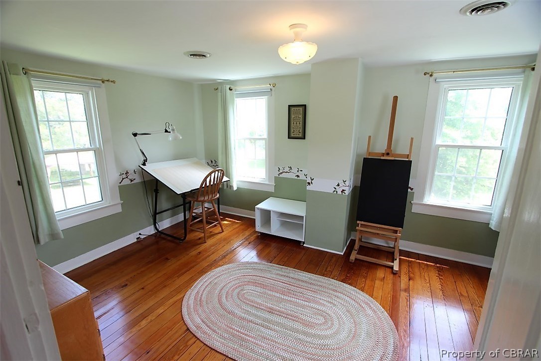 277 Mill Lane Road Cardinal, VA 23025 - Photo 34 of 47 a work room with furniture wooden floor and a window