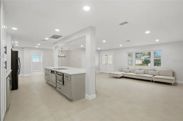 a kitchen with furniture and a counter top space