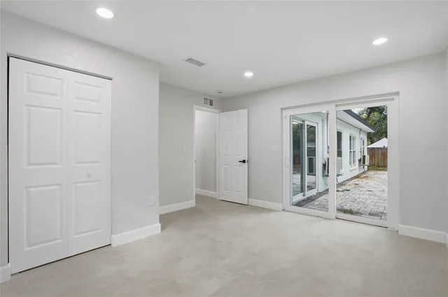 an empty room with windows