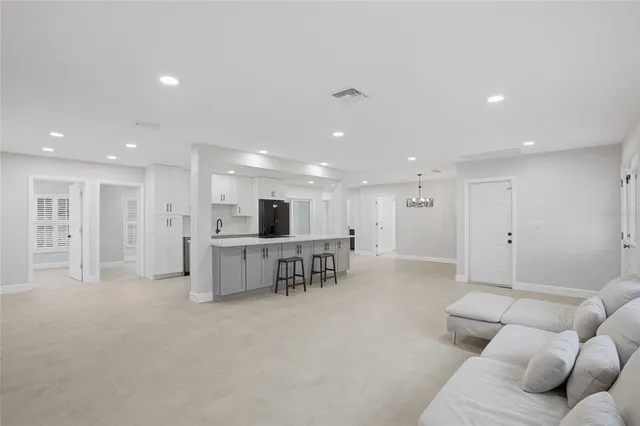 a living room with furniture and a table