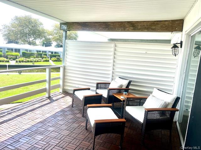 35 Library Avenue, Unit 6J Westhampton Beach, NY 11978 - Photo 3 of 19 View of patio / terrace