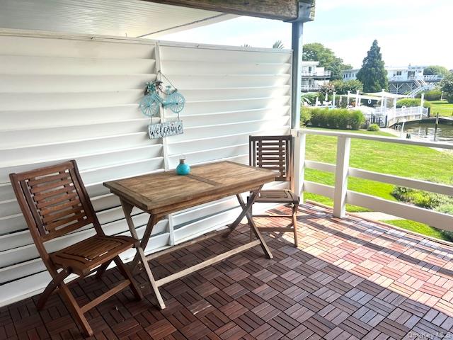 35 Library Avenue, Unit 6J Westhampton Beach, NY 11978 - Photo 4 of 19 View of balcony