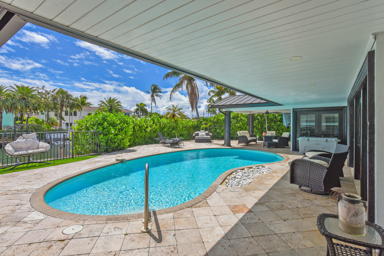 4030 Northeast 25th Avenue Lighthouse Point, FL 33064 - Photo 28 of 50 a view of a swimming pool with a patio