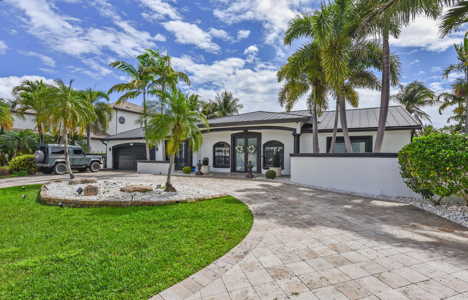 4030 Northeast 25th Avenue Lighthouse Point, FL 33064 - Photo 4 of 50 a view of house with outdoor space and entertaining space