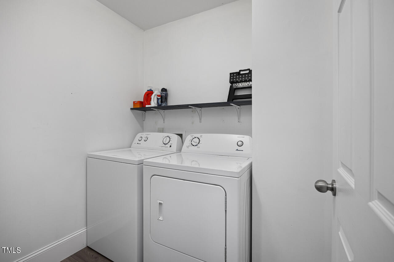 704 Nightshade Way Raleigh, NC 27610 - Photo 31 of 39 a utility room with dryer and washer