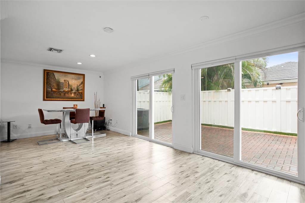 9837 Northwest 2nd Court Plantation, FL 33324 - Photo 15 of 69 a view of a livingroom with furniture window and wooden floor