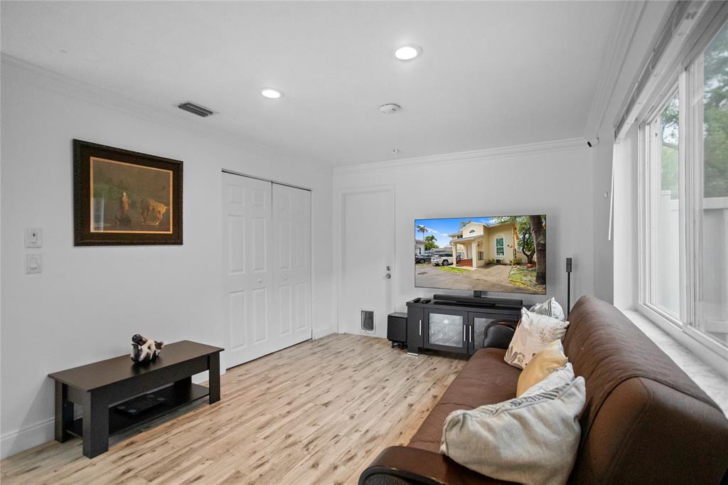 9837 Northwest 2nd Court Plantation, FL 33324 - Photo 23 of 69 a bedroom with a bed and furniture