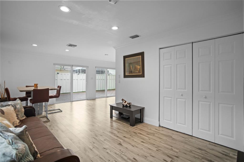 9837 Northwest 2nd Court Plantation, FL 33324 - Photo 26 of 69 a living room with furniture and a wooden floor