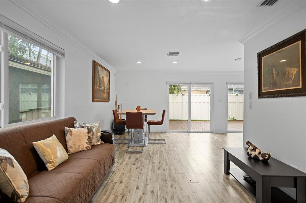 9837 Northwest 2nd Court Plantation, FL 33324 - Photo 27 of 69 a living room with furniture and wooden floor