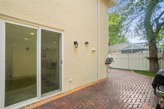 a kitchen with stainless steel appliances granite countertop a refrigerator a stove top oven a sink and dishwasher