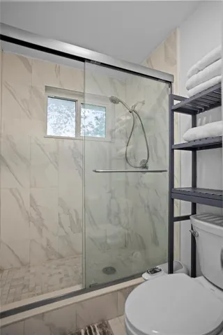 a view of a car park in front of house