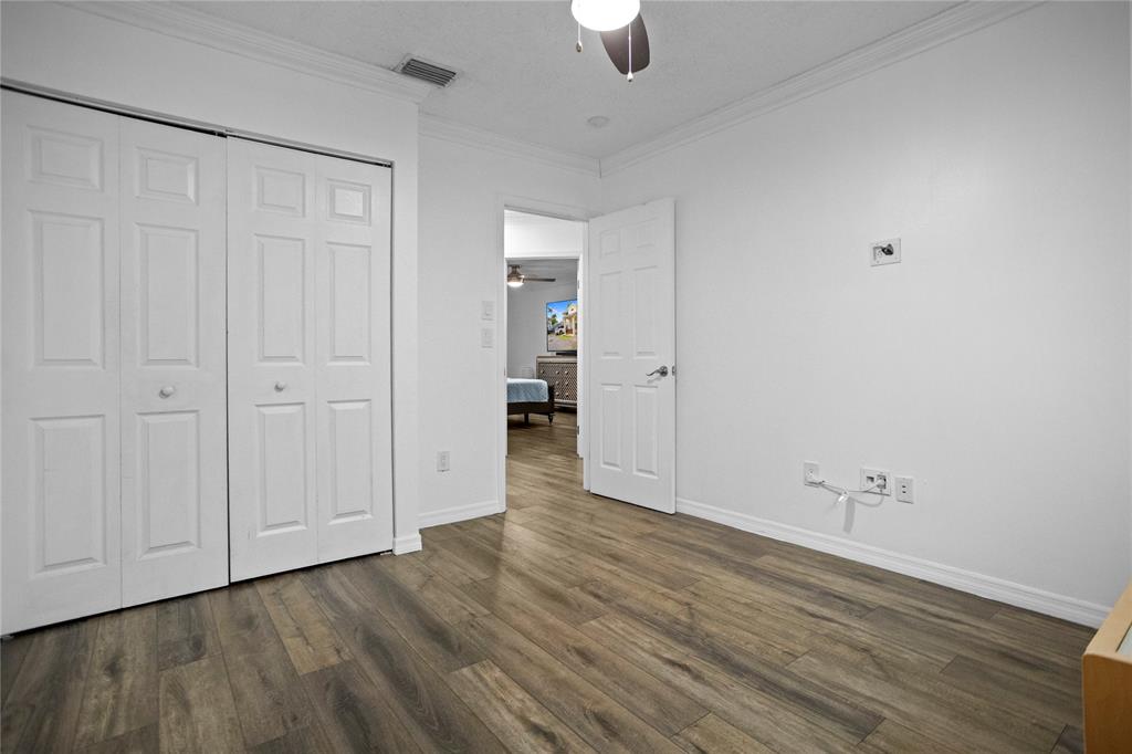 9837 Northwest 2nd Court Plantation, FL 33324 - Photo 57 of 69 a view of an empty room with wooden floor