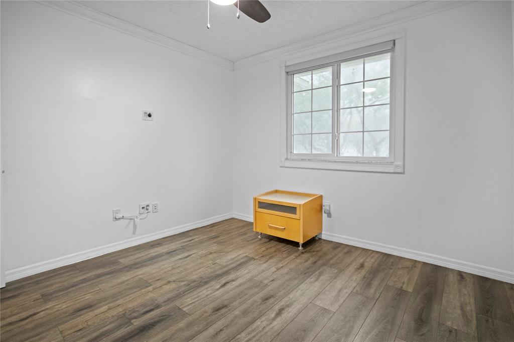 9837 Northwest 2nd Court Plantation, FL 33324 - Photo 58 of 69 an empty room with wooden floor and windows